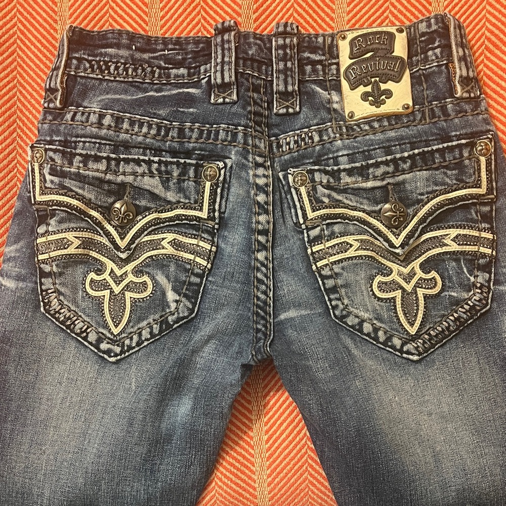 Rock Revival “Owen” Distressed Blue Jeans with Embroidered Pockets